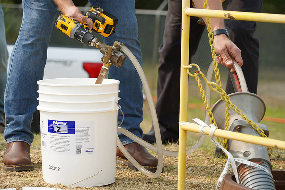 Polywater LZ Lubricant being pumped into a duct