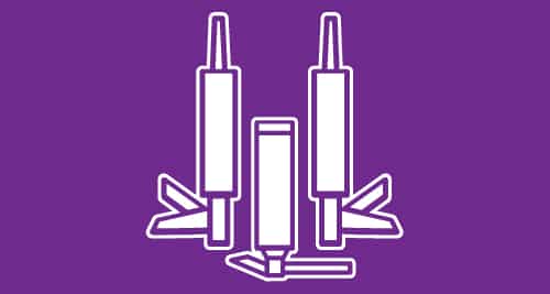 A graphic illustration of two long skinny cartridges in dispensing guns. In between them is an upside down aerosol can. The image has an purple background.